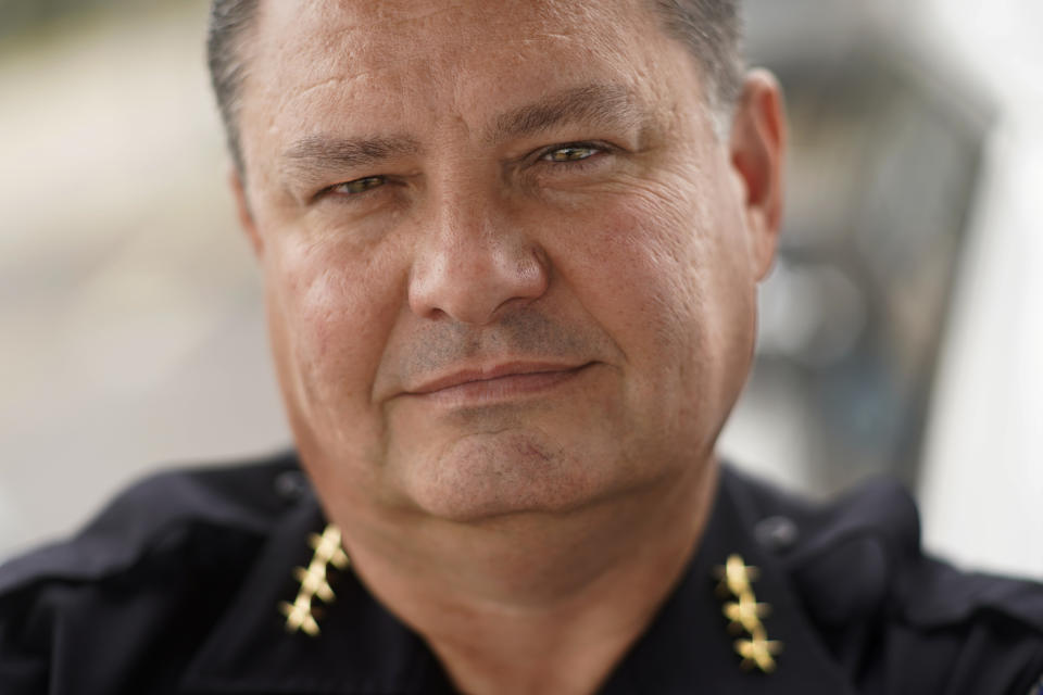 Kurt Whisenand, the deputy police chief in Rockford, Ill., poses for a portrait Monday, Sept. 20, 2021, in Rockford. Some teenagers in Rockford were arrested so many times that Whisenand knew them by name. But a report from a few years ago gave Whisenand the most pause, some of the offenders then 13 or 14 years old, had been sexually abused by the same man whom one of the boys had met on social media. The money flowing to cities and states from the American Rescue Plan is so substantial and can be used for so many purposes that communities across the U.S. are trying out new, longer-term ways to fix what’s broken in their cities. (AP Photo/Charles Rex Arbogast)