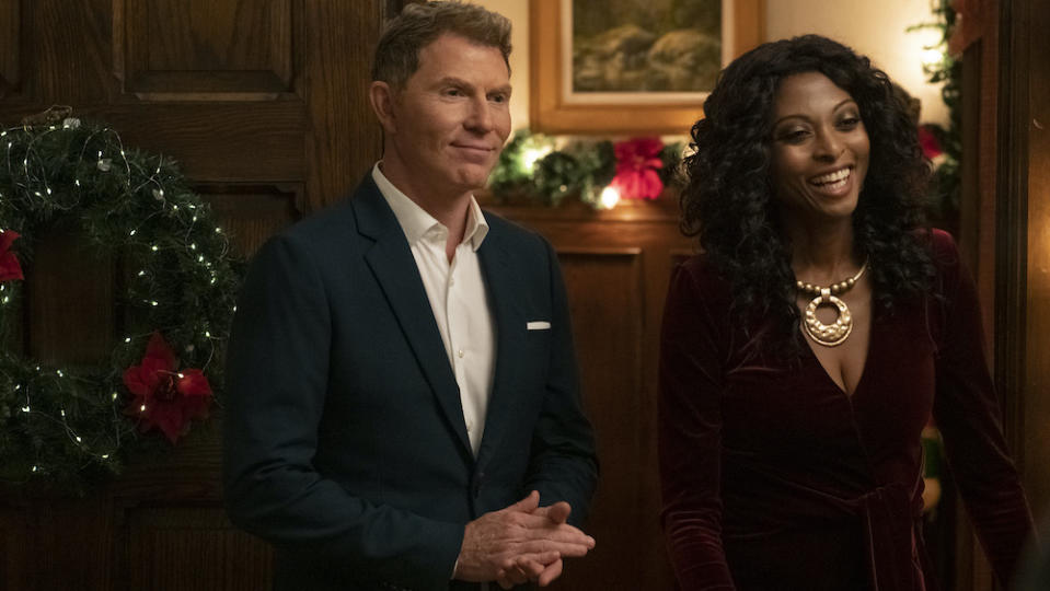 Bobby Flay and Kathy Maloney in Discovery+’s “One Delicious Christmas” - Credit: Albert Camicioli