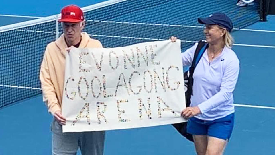 Tennis greats John McEnroe and Martina Navratilova unfurled a banner calling for Margaret Court Arena to be renamed Evonne Goolagong Arena after a legends match at the Australian Open. Picture: Twitter