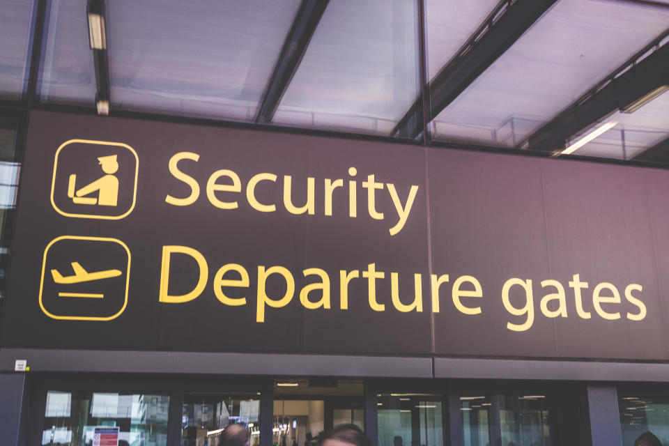 London, England - may 30, 2017: Information sign showing  way to departure gates and security at Heathrow Airport in London, England.