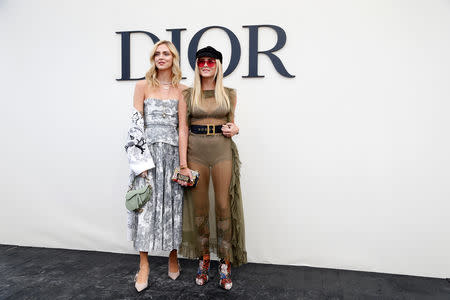 Chiara Ferragni and Valentina Ferragni pose during a photocall before the Spring/Summer 2019 women's ready-to-wear collection show for fashion house Dior during Paris Fashion Week in Paris, France, September 24, 2018. REUTERS/Stephane Mahe