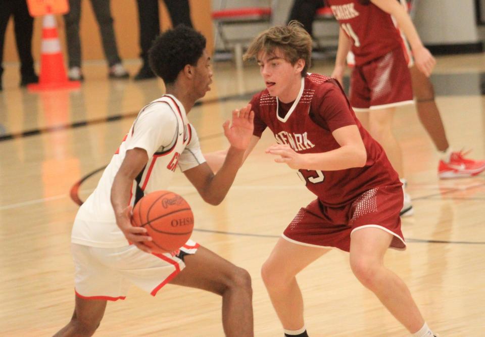 Newark's Bodie Smith guards a Groveport player on Tuesday.