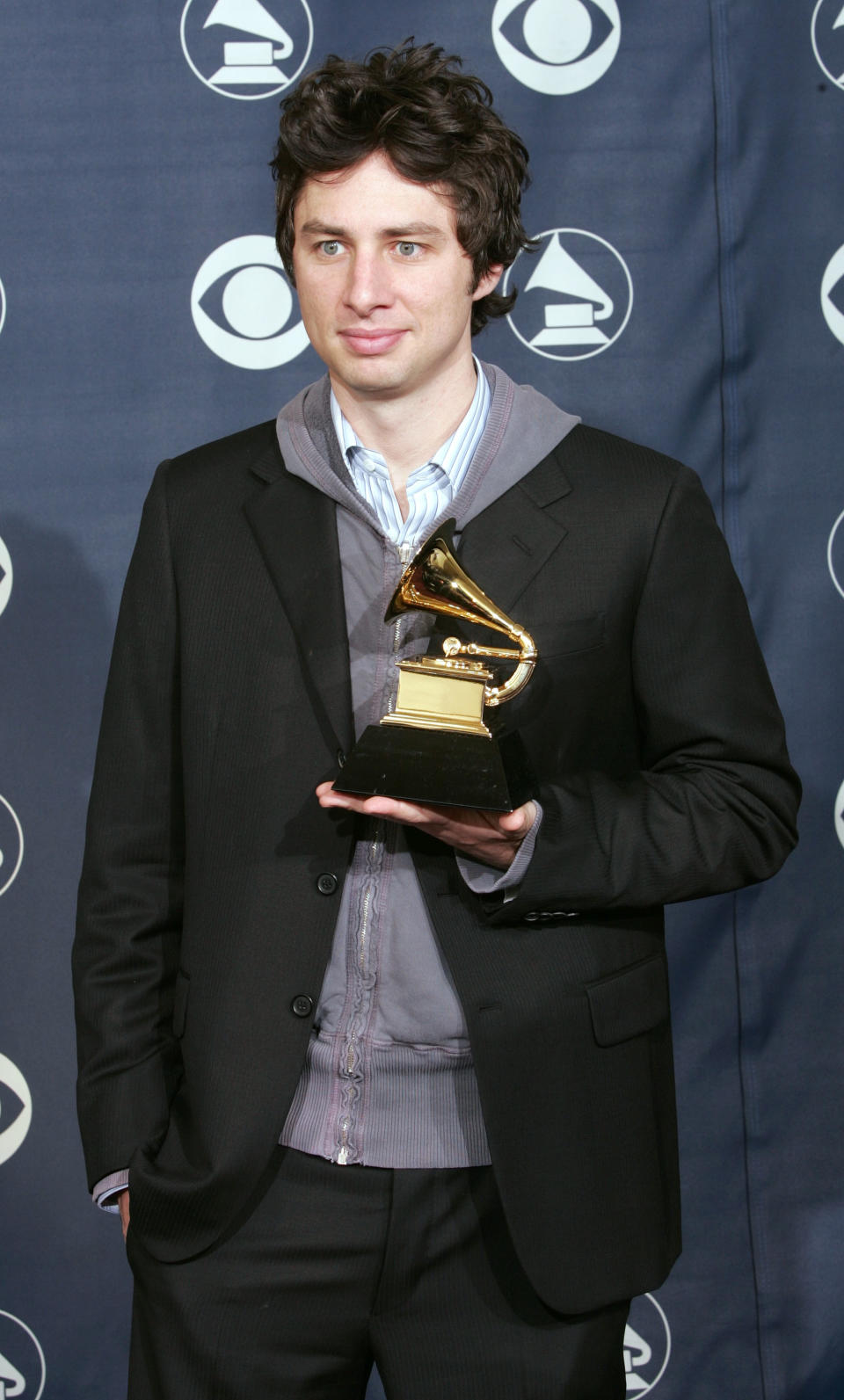 Zach Braff holding his Grammy