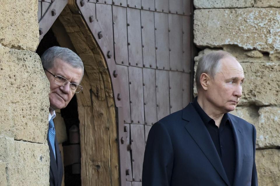 FILE - Russian President Vladimir Putin, right, and Presidential Envoy to the North Caucasian Federal District Yury Yakovlevich Chaika visit the Naryn-Kala fortress in Derbent, Russia on Wednesday, June 28, 2023. Jews in the predominantly Muslim region of Dagestan in southern Russia say they are determined to regroup and rebuild following a deadly attack by Islamic militants on June 23 on Christian and Jewish houses of worship in Derbent and the regional capital of Makhachkala. (Sergei Savostyanov, Sputnik, Kremlin Pool Photo via AP, File)