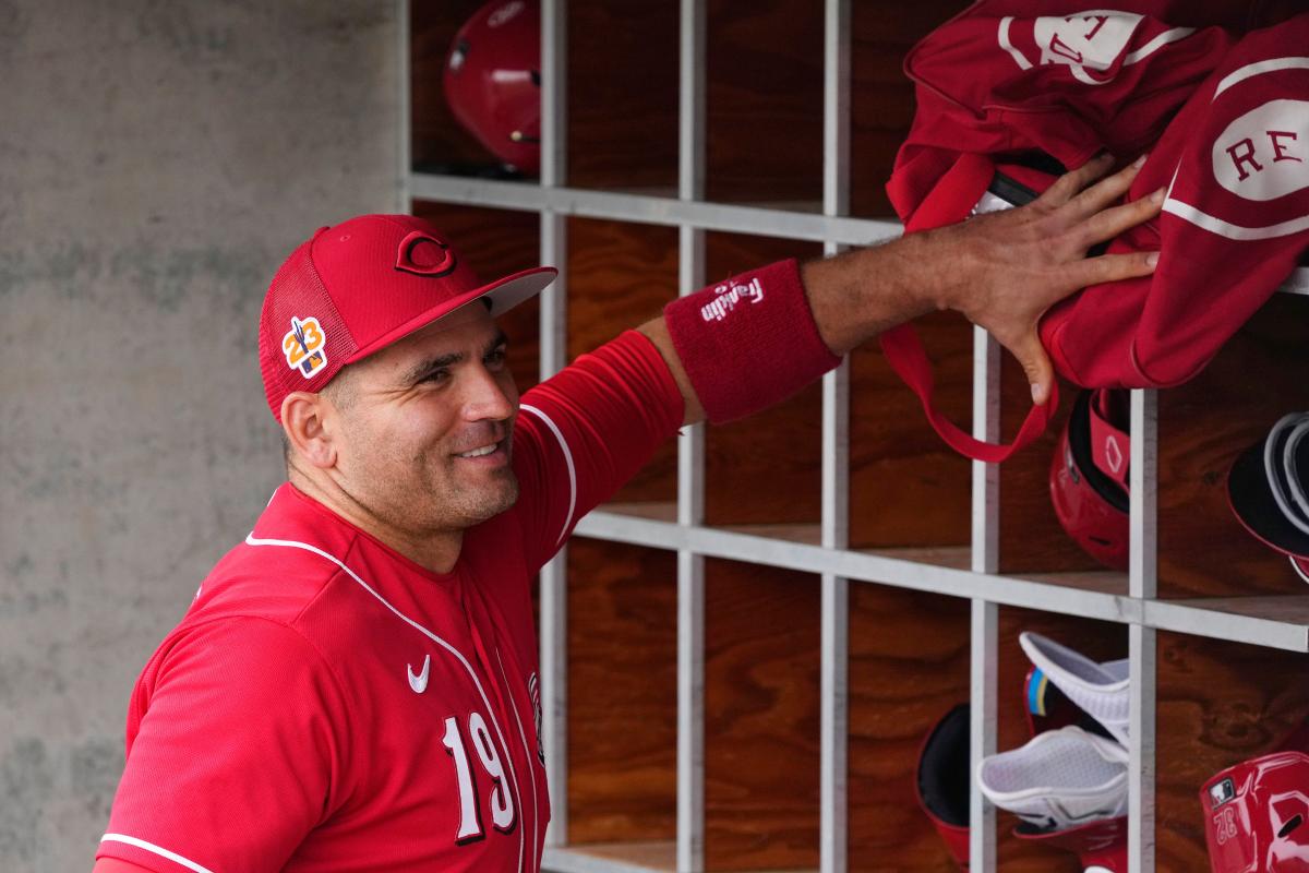 Why Joey Votto wore a high school football jersey in press conference