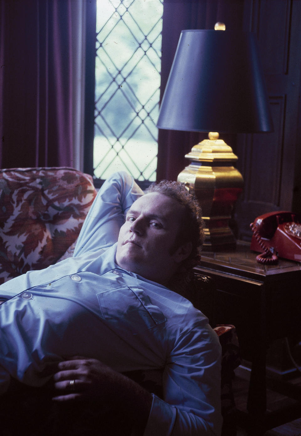 FILE - "Hustler" magazine publisher Larry Flynt is seen at his home on June 1978, in Ohio. Flynt, who turned "Hustler" magazine into an adult entertainment empire while championing First Amendment rights, has died at age 78. His nephew, Jimmy Flynt Jr., told The Associated Press that Flynt died Wednesday, Feb. 10, 2021, of heart failure at his Hollywood Hills home in Los Angeles. (AP Photo/Harry Cabluck, File)