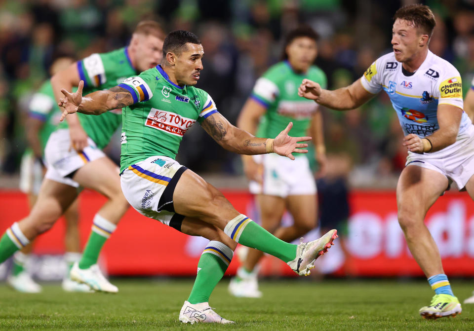 CANBERRA, AUSTRALIA - APRIL 14: Jamal Fogarty of the Raiders kicks a field goal to win during the round six NRL match between Canberra Raiders and Gold Coast Titans at GIO Stadium, on April 14, 2024, in Canberra, Australia. (Photo by Mark Nolan/Getty Images)