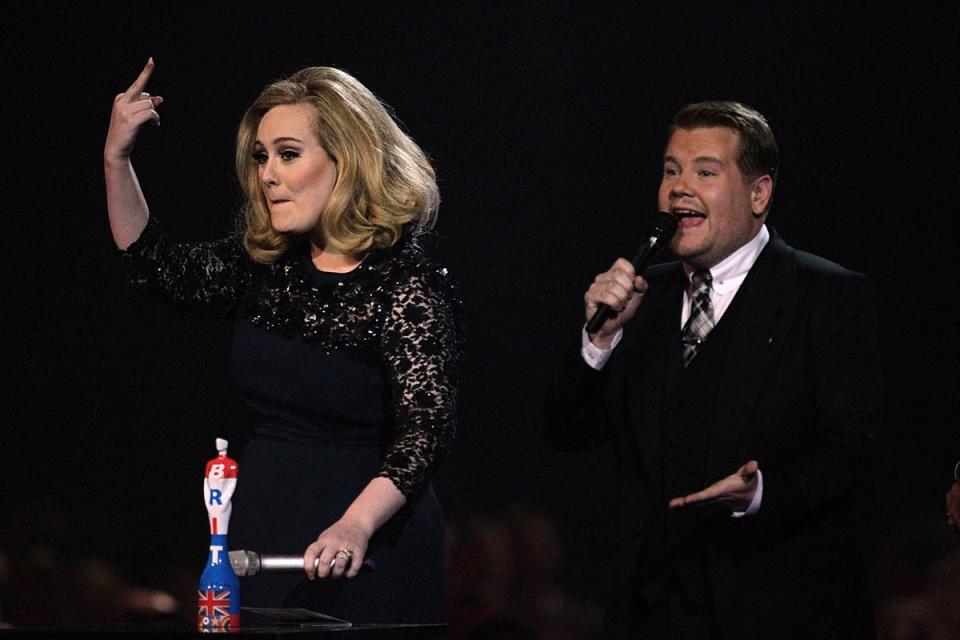 Not impressed: Adele was interrupted making her speech as she collected her award for Album of the Year in 2012 - so she gestured to producers where to go (PA)