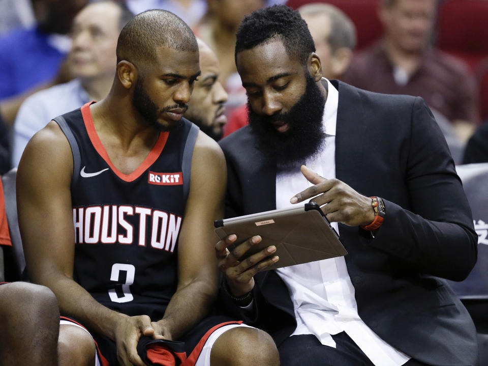 Rockets guards Chris Paul and James Harden are trying to figure it all out. (AP)