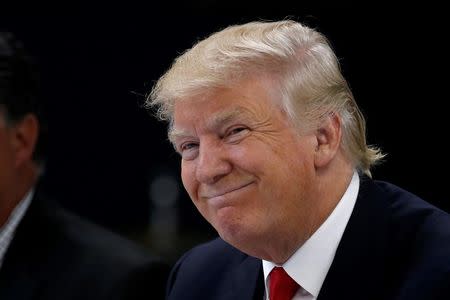 Republican presidential nominee Donald Trump speaks during a round table discussion with law enforcement officials in Akron, Ohio, U.S., August 22, 2016. REUTERS/Carlo Allegri