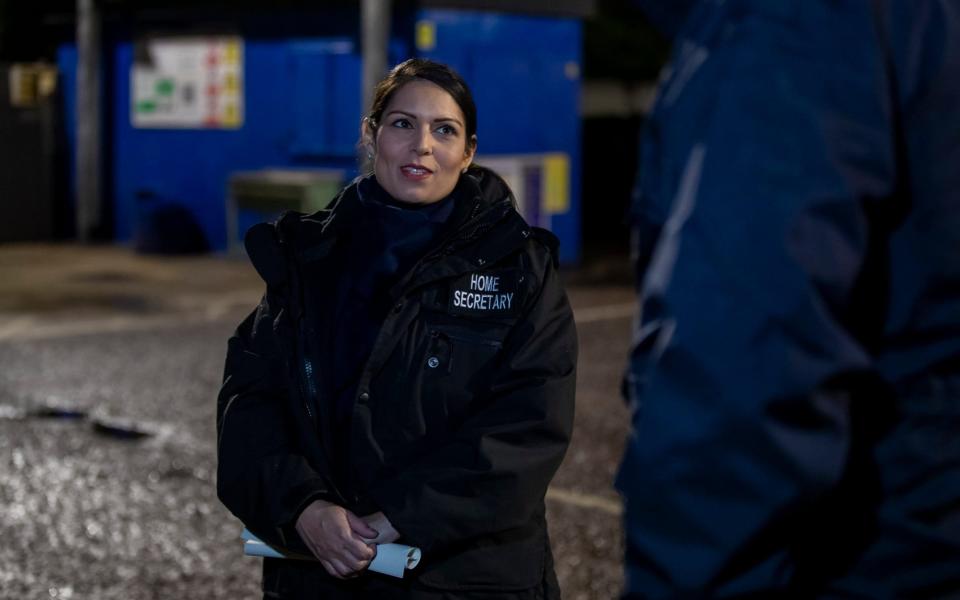 Home Secretary Priti Patel accompanied Immigration Enforcement Officers on an early morning arrest in north London of a suspected suspected of having a significant financial role in an organised crime group linked to people smuggling activity - Heathcliff O'Malley