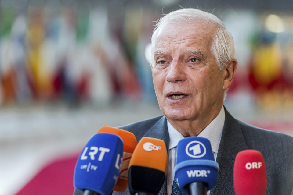 European Union foreign policy chief Josep Borrell speaks with journalists as he arrives for a meeting of EU foreign ministers at the EU Council building in Brussels, Monday, Nov. 14, 2022. EU foreign ministers will hold exchanges of views on the Russian aggression against Ukraine, the Great Lakes region and Western Balkans. (AP Photo/Geert Vanden Wijngaert)