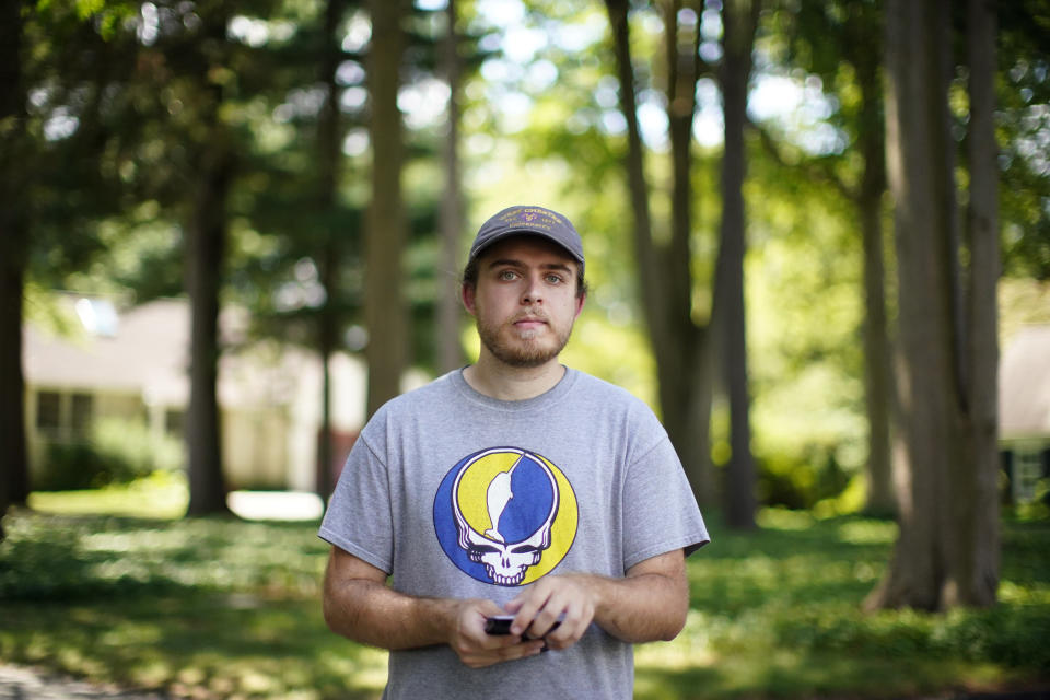 Nick Marcil, 24, of Wayne, Pa., poses for a photograph on Wednesday, Aug. 24, 2022, in Devon, Pa. (AP Photo/Matt Slocum)