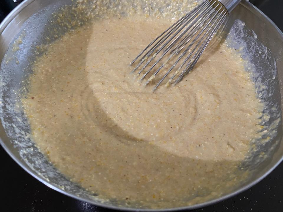 Bob Red Mill's cornbread mix as batter in silver bowl