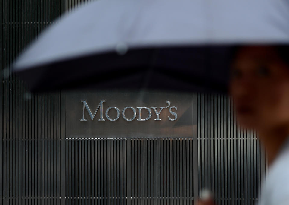 A sign for Moody's rating agency is displayed at the company headquarters in New York