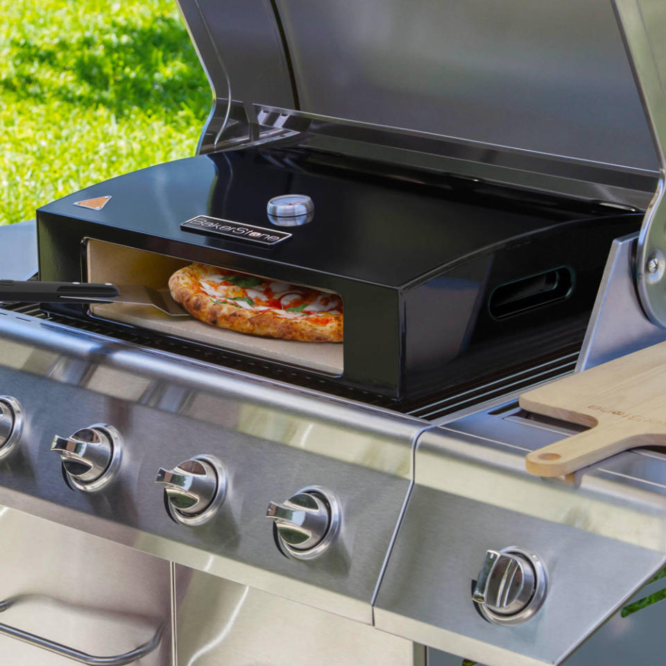 Bakerstone Original Series Grill Top Pizza Oven Box Kit on barbecue range. (Photo via Home Hardware)