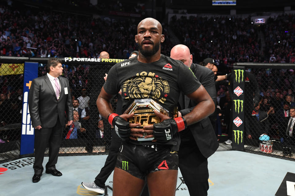 HOUSTON, TEXAS - FEBRUARY 08:  Jon Jones celebrates his victory over Dominick Reyes in their light heavyweight championship bout during the UFC 247 event at Toyota Center on February 08, 2020 in Houston, Texas. (Photo by Josh Hedges/Zuffa LLC via Getty Images)