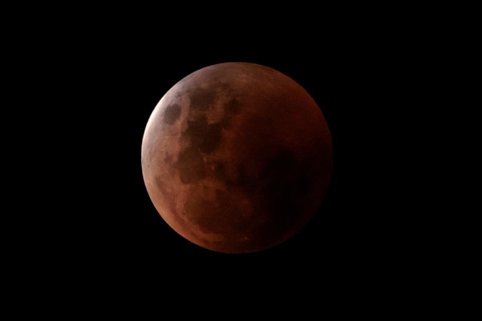 A lunar eclipse is seen in Sydney on Nov. 8, 2022 in Sydney, Australia. Australians experienced the first visible total lunar eclipse of the year on Tuesday, with the eclipse also being visible from New Zealand.