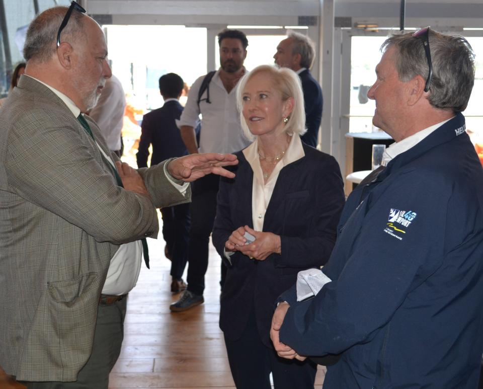 RIDEM director Terry Gray, 11th Hour Racing Team co-founder Wendy Schmidt and Sail Newport Executive Director Brad Read converse at Ocean Summit Newport during the Newport stopover of the Ocean Race on Tuesday, May 16 2023.