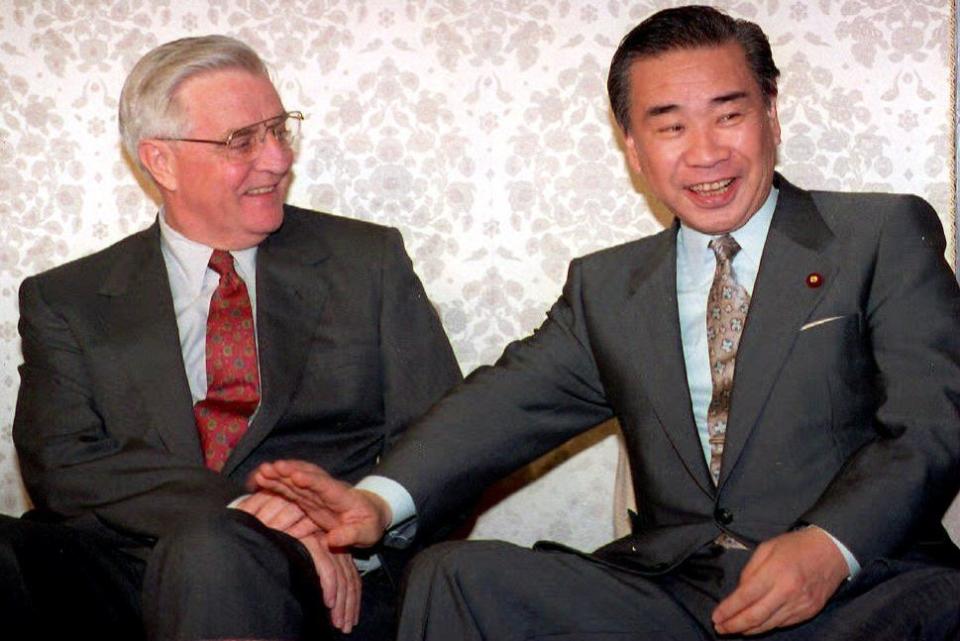 With Japanese politician Tsutomu Hata in 1995AFP/Getty