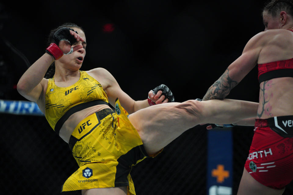 Dec 2, 2023; Austin, Texas, USA; Veronica Hardy (red gloves) fights Jamey-lyn Horth (blue gloves) during UFC Fight Night at Moody Center. Mandatory Credit: Dustin Safranek-USA TODAY Sports