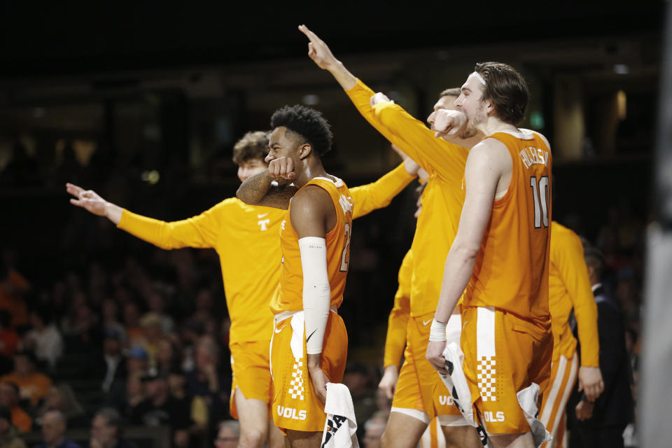 Tennessee players celebrate after a score against Vanderbilt during the second half of an NCAA college basketball game Saturday, Jan. 18, 2020, in Nashville, Tenn. Tennessee won 66-45. (AP Photo/Mark Humphrey)