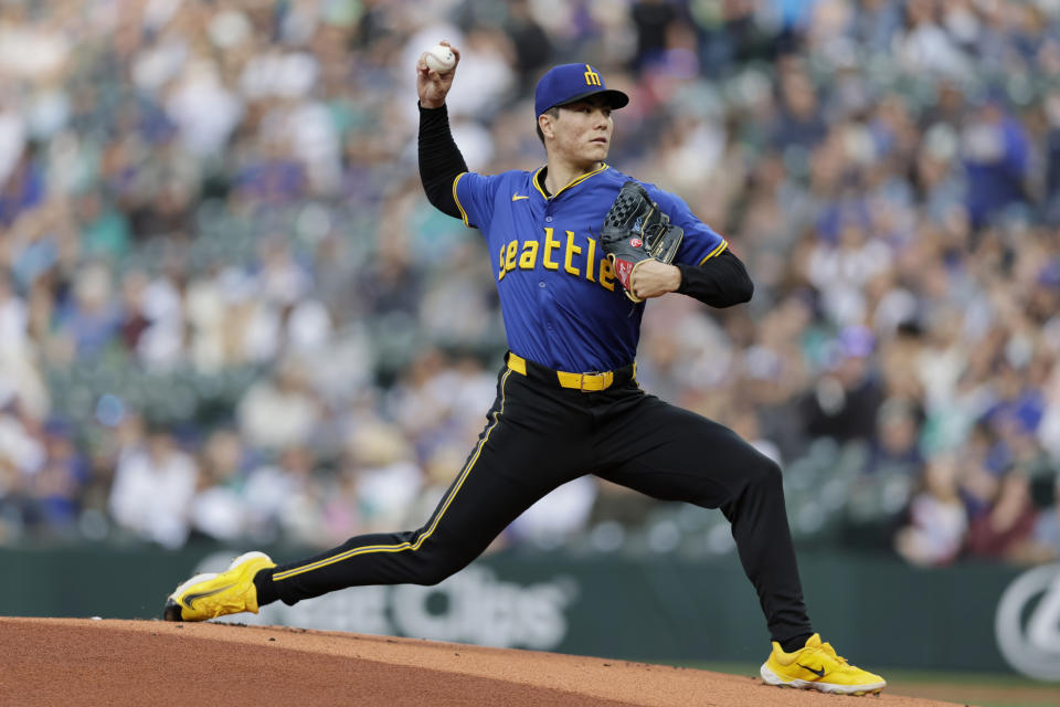 Seattle Mariners starting pitcher Bryan Woo throws to an Los Angeles Angels batter during the first inning of a baseball game, Friday, May 31, 2024, in Seattle. (AP Photo/John Froschauer)