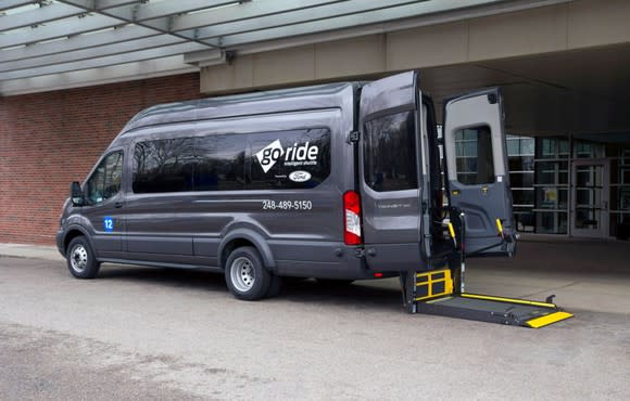 Ford's commercial van with GoRide labeled on the window.