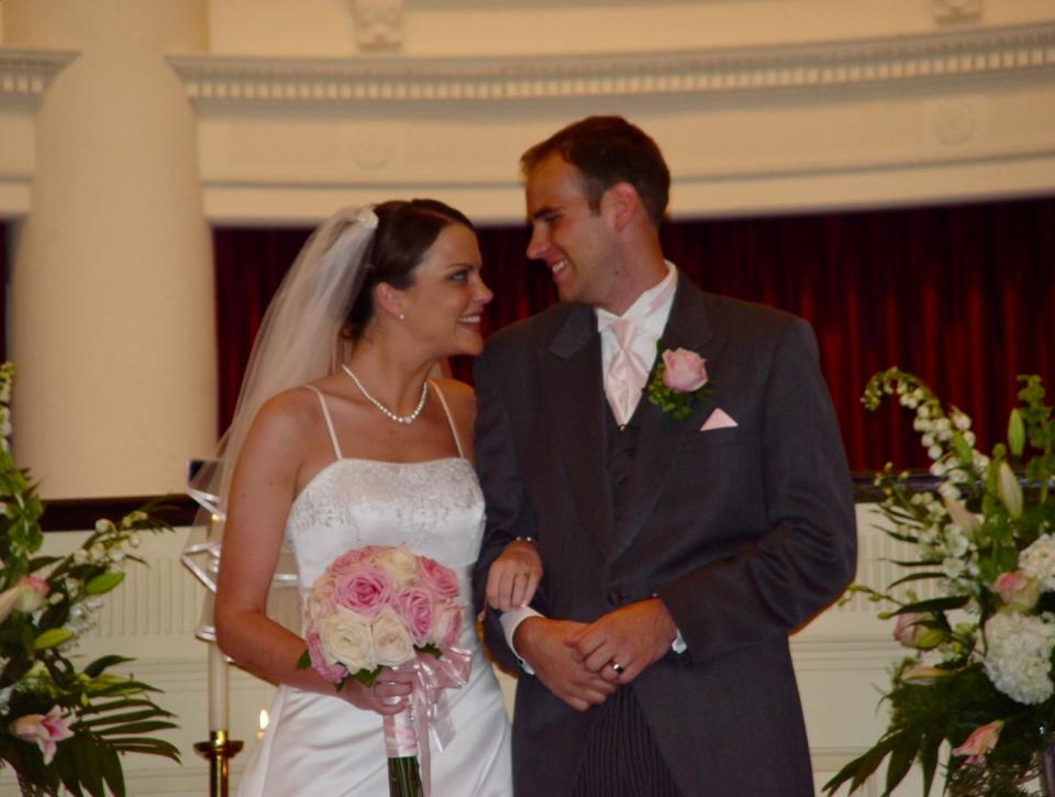 Melanie Obitz-Bukartek and her husband on their wedding day.