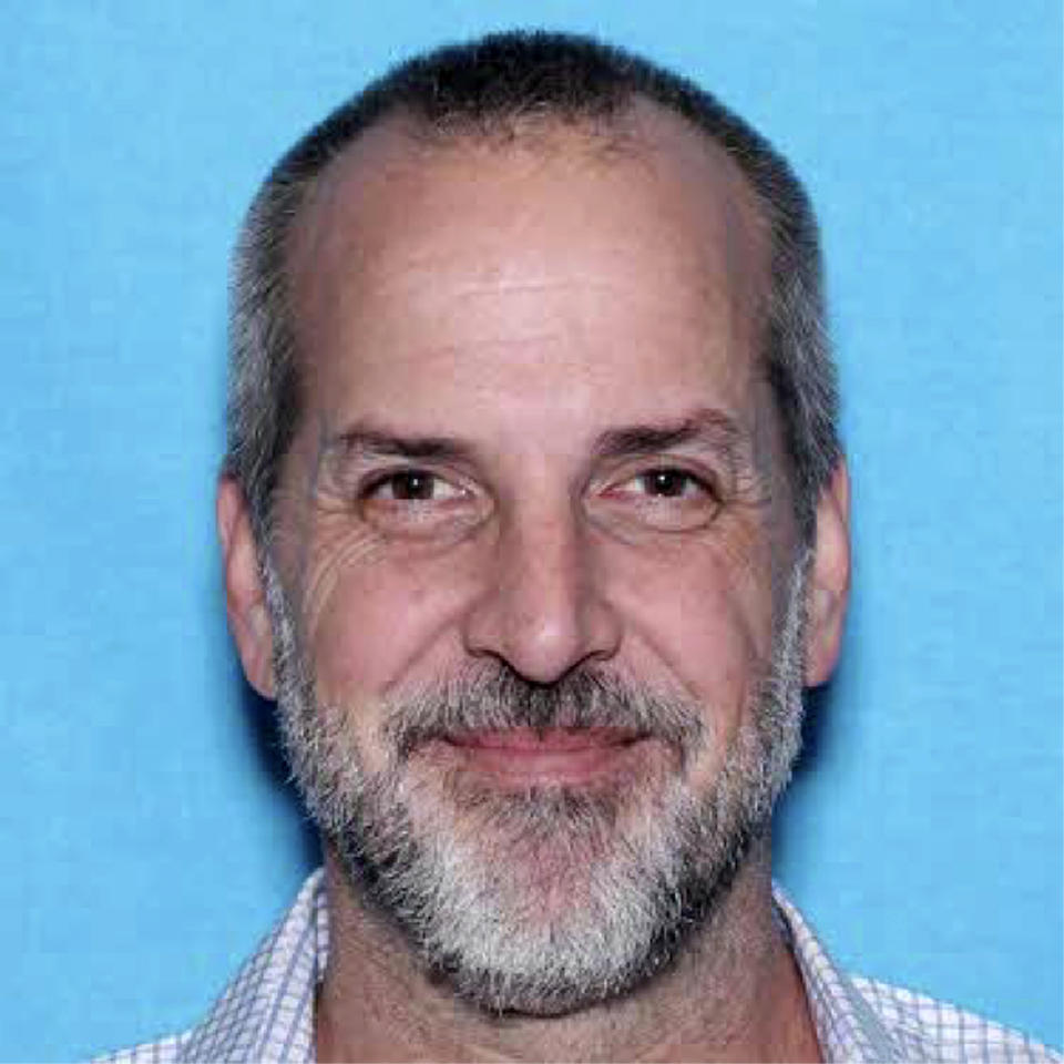 This Department of Motor Vehicles photo released by the FBI in Oregon shows Robert Arnold Koester. Authorities in Oregon say Koester, a professional photographer, has been indicted on more than 30 charges, including rape, after he allegedly brought young women and girls to a rural property and drugged and assaulted them. (FBI Oregon via AP)
