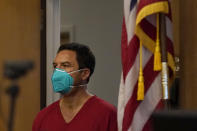 Scott Peterson walks into a courtroom at the San Mateo County Superior Court in Redwood City, Calif., Thursday, Aug. 11, 2022. Peterson is in court for a hearing to determine whether he gets a new trial in the murder of his pregnant wife because of juror misconduct. (AP Photo/Jeff Chiu, Pool)