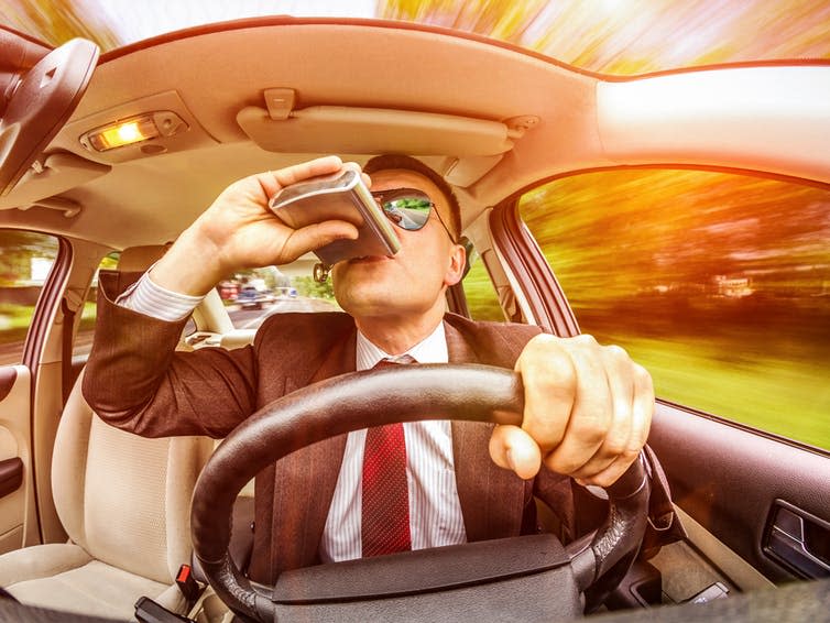 <span class="caption">Problems associated with alcohol cost one per cent of GDP.</span> <span class="attribution"><a class="link " href="https://www.shutterstock.com/image-photo/drunk-man-suit-sunglasses-driving-on-194789030?src=AtlnlftRxlTAYDmoDfOTVQ-1-87" rel="nofollow noopener" target="_blank" data-ylk="slk:Andrey Armyagov/Shutterstock;elm:context_link;itc:0;sec:content-canvas">Andrey Armyagov/Shutterstock</a></span>