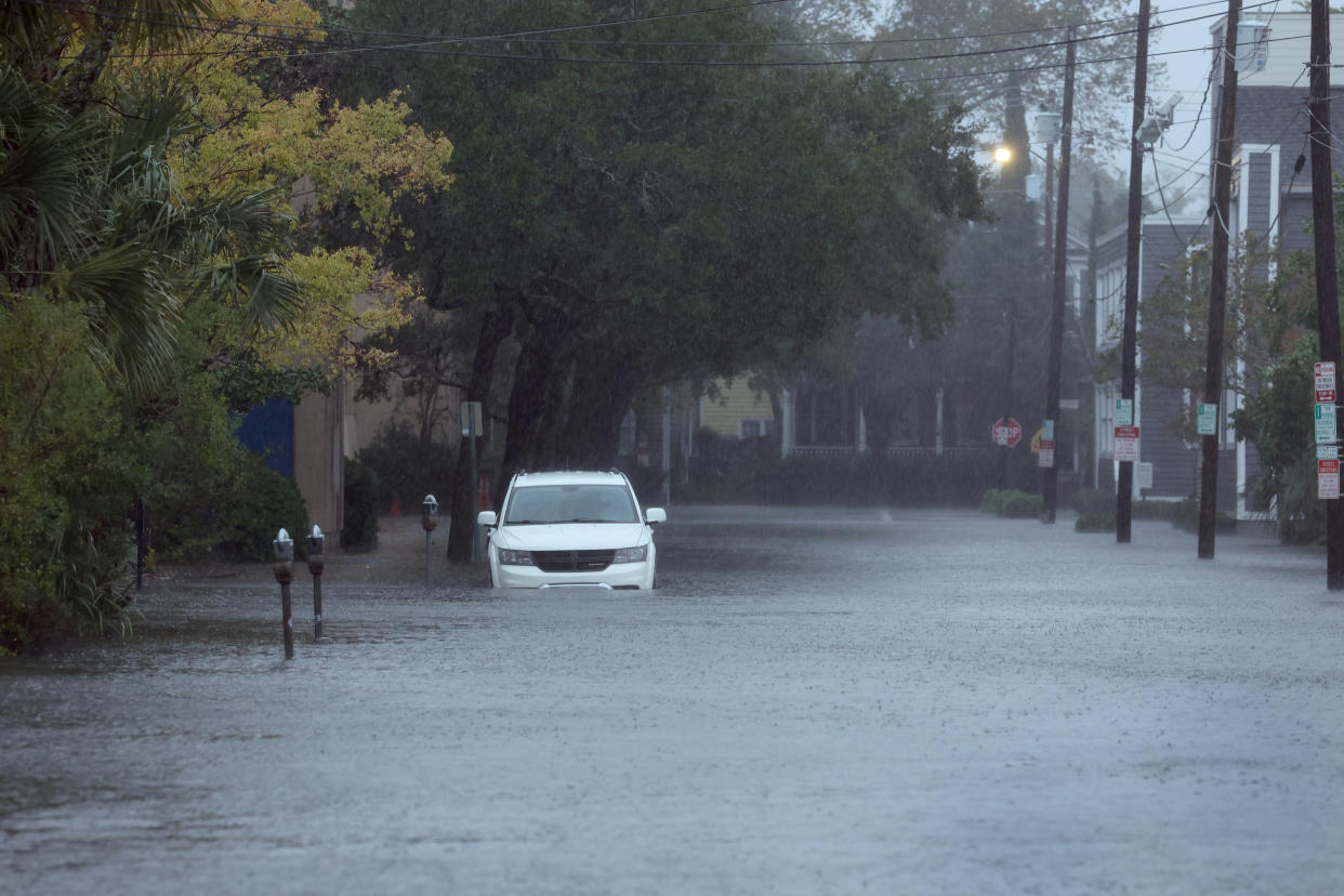 Hurricane Ian floods a street in Charleston, S.C., on Friday