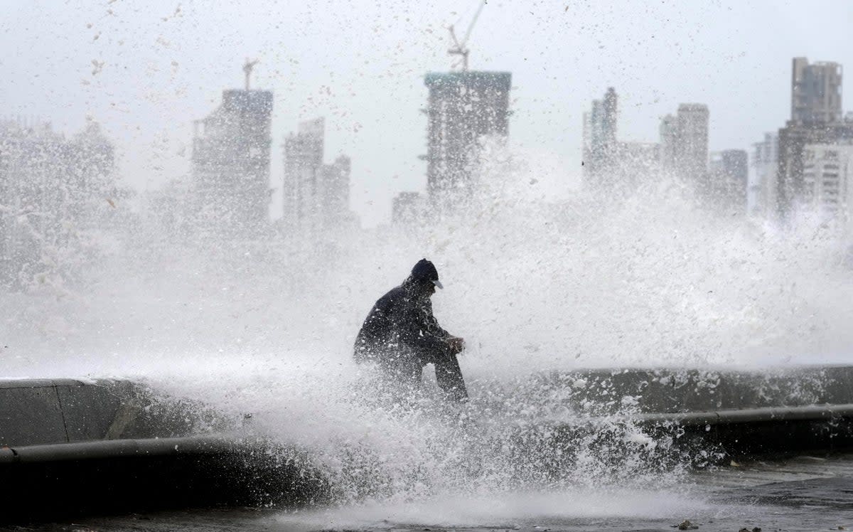 High tide waves on the Arabian Sea coast during monsoon rains in Mumbai (AP)