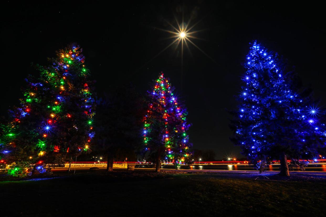 A full moon shines down Saturday, November 28, 2020 as holiday lights decorate Lakeside Park in Fond du Lac.