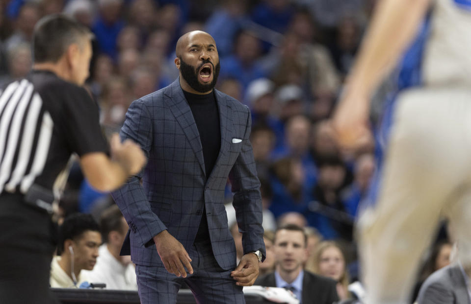 Villanova coach Kyle Neptune yells to players as they take on Creighton during the first half of an NCAA college basketball game Wednesday, Dec. 20, 2023, in Omaha, Neb. (AP Photo/Rebecca S. Gratz)