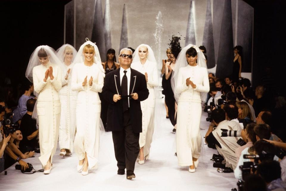 Karl Lagerfeld with Chanel brides in 1995. 