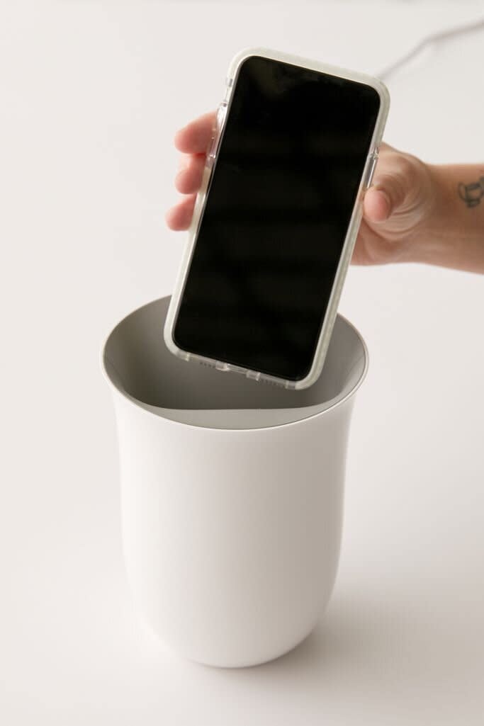 This UV light sanitizer bin charges phones and disinfects phones in 20 minutes. <a href="https://fave.co/313ZbM2" target="_blank" rel="noopener noreferrer">Find it for $80 at Urban Outfitters</a>.