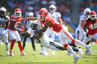 <p>Wide receiver Keenan Allen #13 of the Los Angeles Chargers dives for a pass tackled by cornerback Steven Nelson #20 of the Kansas City Chiefs in the first quarter at StubHub Center on September 9, 2018 in Carson, California. (Photo by Harry How/Getty Images) </p>