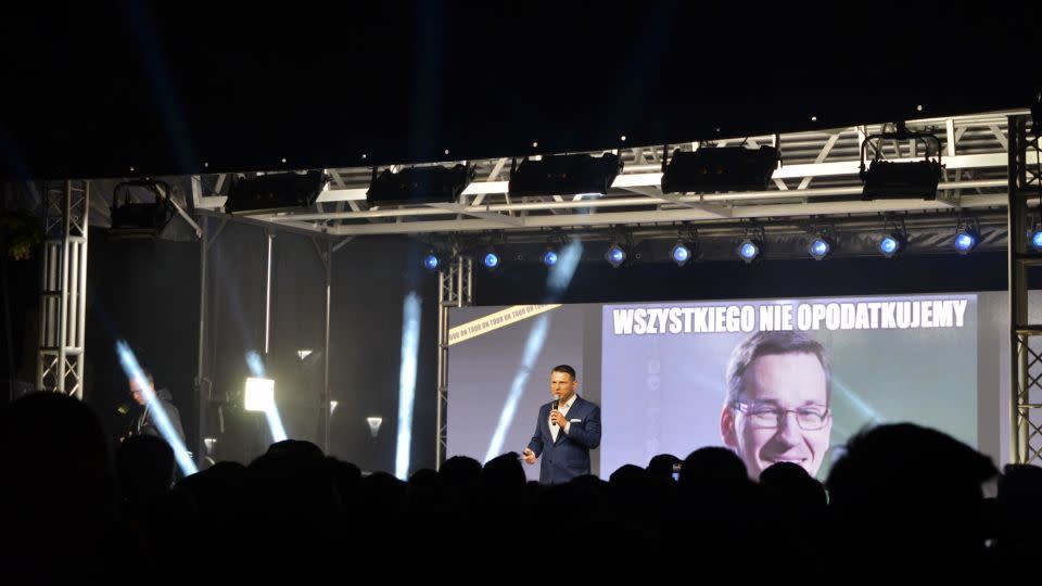 Confederation's rallies at times resemble a rock concert, and at others a stand-up routine. The group's young co-leader cycles through memes, mocking the major players in Polish politics. - Rob Picheta/CNN
