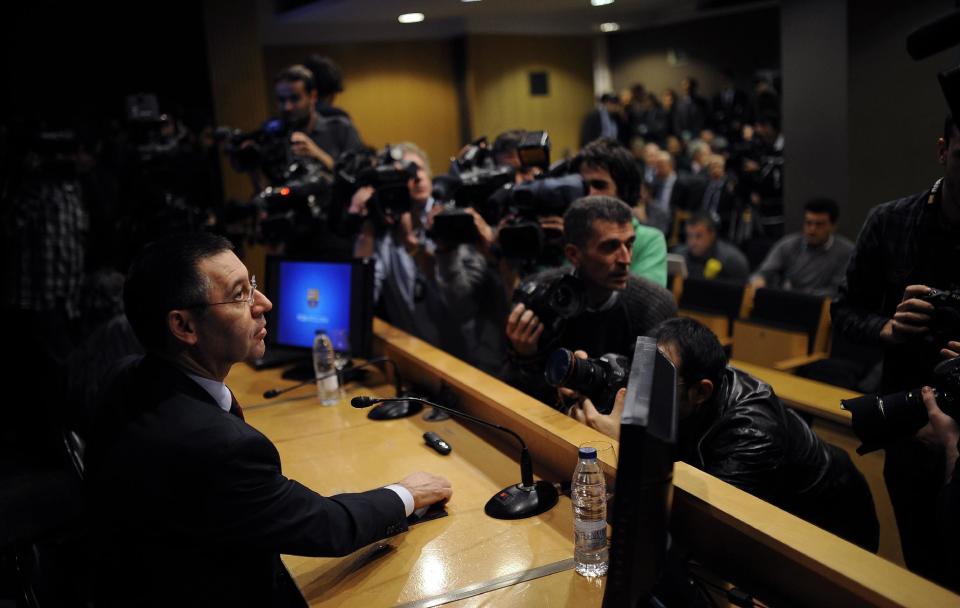 FC Barcelona's President Josep Maria Bartomeu attends a press conference at the Camp Nou stadium in Barcelona, Spain, Friday, Jan 24, 2014. Barcelona says its board of directors is calling an ''extraordinary'' meeting, fueling Spanish media reports that club president Sandro Rosell is under pressure to consider stepping down due to the lawsuit regarding Neymar's transfer. Barcelona said in a statement that the meeting will take place on Thursday afternoon, a day after a judge agreed to hear a lawsuit brought by a Barcelona club member over the cost of Neymar's signing. (AP Photo/Manu Fernandez)