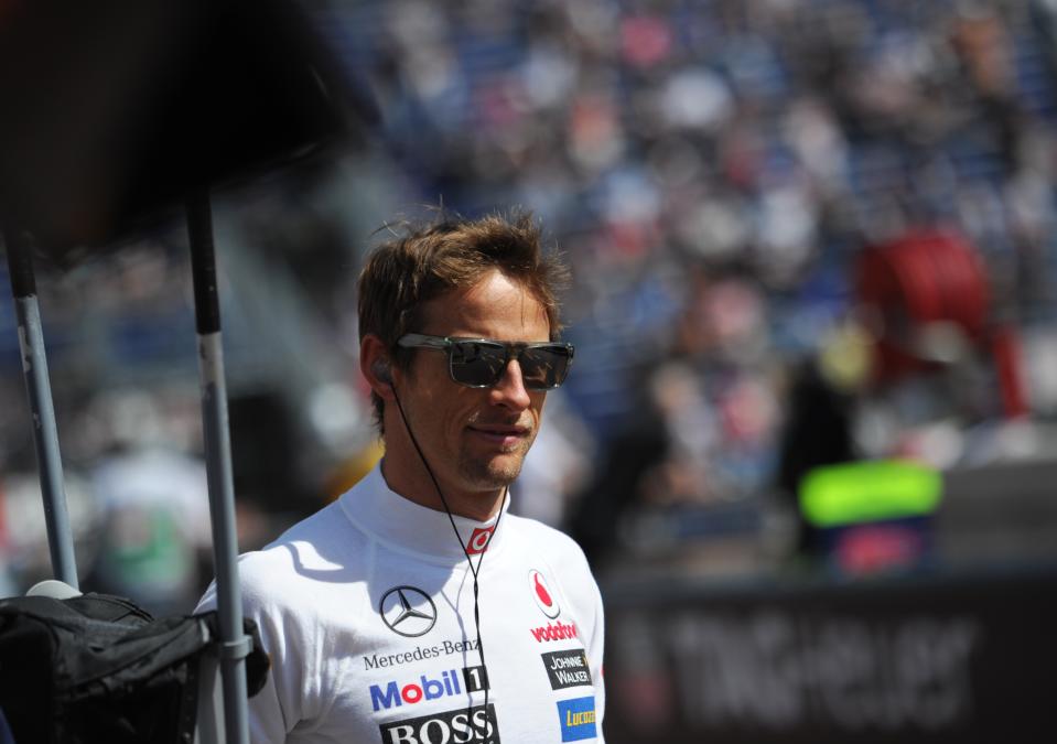 McLaren Mercedes' British driver Jenson Button stands in the pits during first practice session at the Circuit de Monaco on May 24, 2012 in Monte Carlo ahead of the Monaco Formula One Grand Prix. AFP PHOTO / DIMITAR DILKOFFDIMITAR DILKOFF/AFP/GettyImages