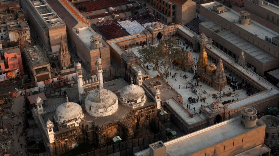 The Gyanvapi mosque, left, and Kashiviswanath Temple on the banks of the river Ganges in Varanasi, India, December 12, 2021. - Rajesh Kumar Singh/AP