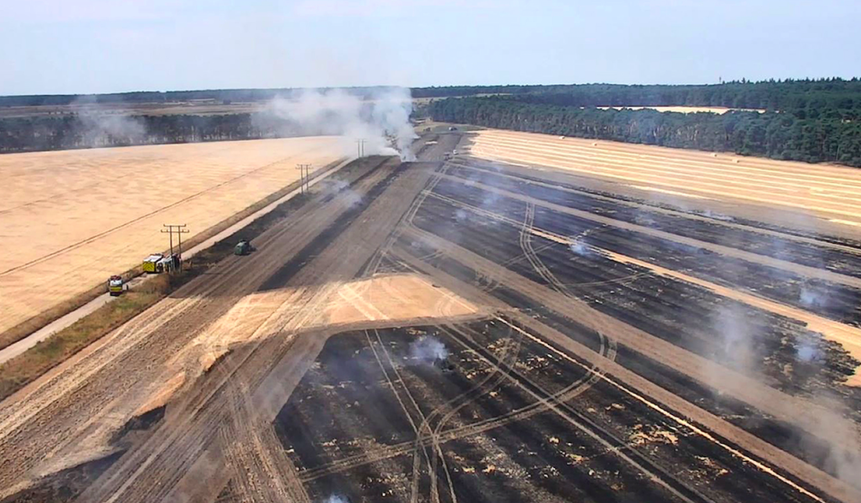 <em>A crop fire in Elveden, Suffolk, was brought under control by 15 fire engines (PA)</em>