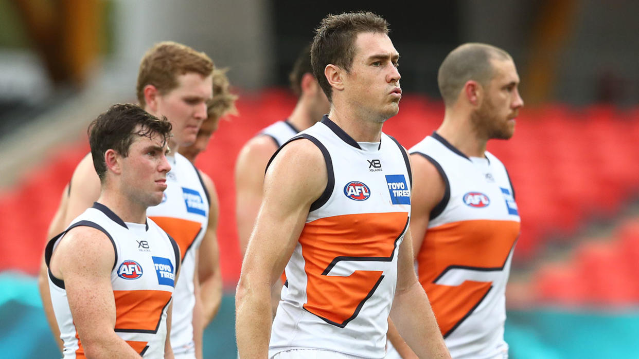 GWS star Jeremy Cameron is pictured here alongside teammates.