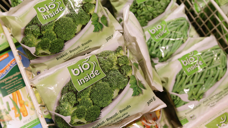 Bags of frozen broccoli