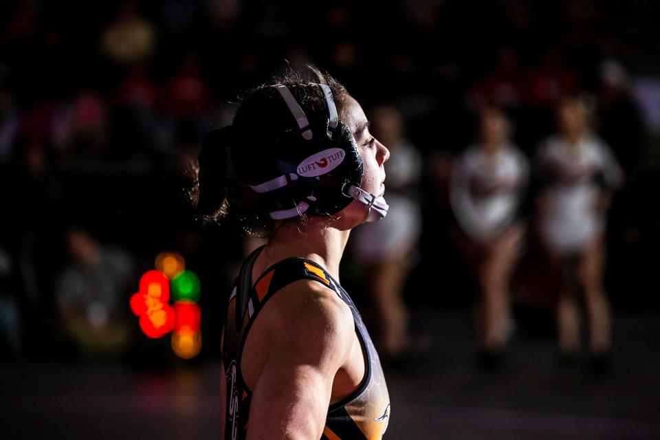 Charles City's Lilly Luft is introduced before wrestling at 130 pounds in the finals during the IGHSAU state girls wrestling tournament, Friday, Feb. 3, 2023, at the Xtream Arena in Coralville, Iowa.