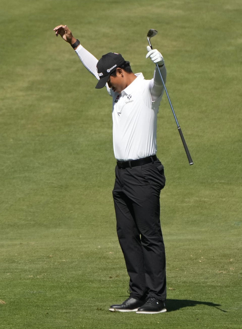 S.H. Kim, of South Korea, reacts after holing out from the 14th fairway of the Silverado Resort North Course for an eagle during the first round of the Fortinet Championship PGA golf tournament in Napa, Calif., Thursday, Sept. 14, 2023. (AP Photo/Eric Risberg)