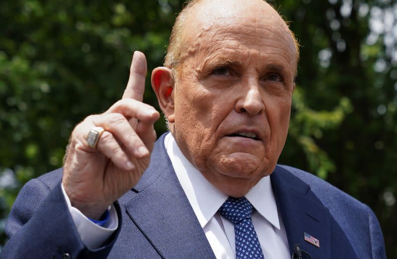 Rudolph Giuliani speaks at the White House in Washington