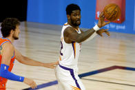 Phoenix Suns' Deandre Ayton looks to pass against the Oklahoma City Thunder during the second quarter of an NBA basketball game Monday, Aug. 10, 2020, in Lake Buena Vista, Fla. (Mike Ehrmann/Pool Photo via AP)